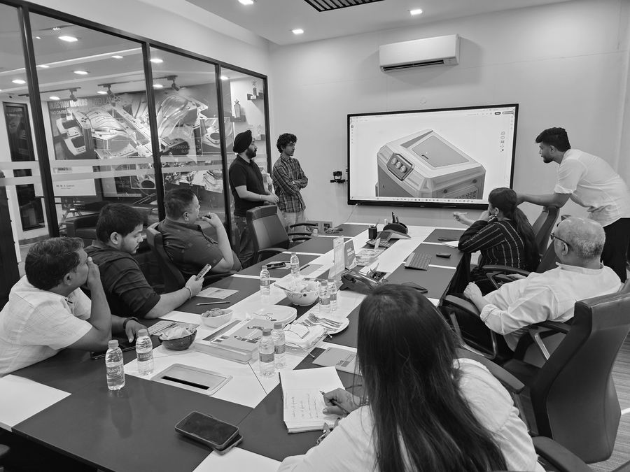 Full team design review, appliance housing on screen
